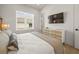 Spacious bedroom with large window and built-in dresser at 106 9Th S St, Bradenton Beach, FL 34217