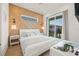 Bedroom with sliding doors leading to balcony at 106 9Th S St, Bradenton Beach, FL 34217