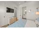 Bedroom with light blue bedding and ensuite bath at 106 9Th S St, Bradenton Beach, FL 34217