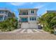 Two-story home with double garage and attractive landscaping at 106 9Th S St, Bradenton Beach, FL 34217