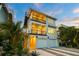 Two-story home with double garage and attractive landscaping at 106 9Th S St, Bradenton Beach, FL 34217