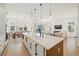 Open concept kitchen with large island and breakfast bar at 106 9Th S St, Bradenton Beach, FL 34217