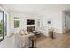Bright and airy living room with comfortable seating and hardwood floors at 106 9Th S St, Bradenton Beach, FL 34217