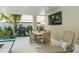Outdoor patio with seating, dining area, and grill at 106 9Th S St, Bradenton Beach, FL 34217