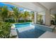 Inviting swimming pool with a spacious patio area at 106 9Th S St, Bradenton Beach, FL 34217