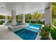 Relaxing pool and spa area with covered patio creating a private retreat at 106 9Th S St, Bradenton Beach, FL 34217