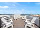 Enjoy water views from this rooftop deck with comfy seating at 106 9Th S St, Bradenton Beach, FL 34217