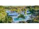 Relaxing community pool view overlooking a lake at 1109 Edgewater Cir # 1109, Bradenton, FL 34209