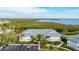 Condo building showcasing waterfront and lush landscape at 1109 Edgewater Cir # 1109, Bradenton, FL 34209
