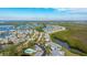 An aerial view of a waterfront community with a pool and private waterway access at 1109 Edgewater Cir # 1109, Bradenton, FL 34209