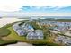 Aerial view of waterfront community with lush landscaping and multiple buildings at 1109 Edgewater Cir # 1109, Bradenton, FL 34209