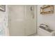 Bathroom with a shower and toilet, with additional storage at 1109 Edgewater Cir # 1109, Bradenton, FL 34209