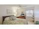 Guest bedroom with a queen-size bed and window seating at 1109 Edgewater Cir # 1109, Bradenton, FL 34209