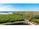 Community boardwalk winds through lush mangroves at 1109 Edgewater Cir # 1109, Bradenton, FL 34209