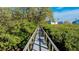 Nature boardwalk through lush mangrove trees at 1109 Edgewater Cir # 1109, Bradenton, FL 34209