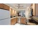 Well-equipped kitchen featuring stainless steel appliances and granite countertops at 1109 Edgewater Cir # 1109, Bradenton, FL 34209