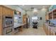 Well-equipped community kitchen with stainless steel appliances at 1109 Edgewater Cir # 1109, Bradenton, FL 34209