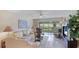 Spacious living room with patio access and scenic views at 1109 Edgewater Cir # 1109, Bradenton, FL 34209