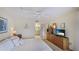 Main bedroom with ensuite bathroom access and dresser at 1109 Edgewater Cir # 1109, Bradenton, FL 34209