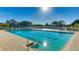 Resort-style pool with ample deck space and lounge chairs at 1109 Edgewater Cir # 1109, Bradenton, FL 34209