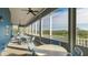 Relaxing screened porch with outdoor seating at 1109 Edgewater Cir # 1109, Bradenton, FL 34209