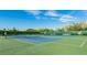 Two well maintained tennis courts at 1109 Edgewater Cir # 1109, Bradenton, FL 34209