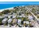 Beachfront property with ocean views and lush landscaping at 112 Mangrove Ave, Anna Maria, FL 34216