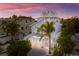 Three-story beach house with a unique design, visible from above at 112 Mangrove Ave, Anna Maria, FL 34216