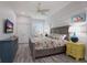 Spacious bedroom with coastal decor and hardwood floors at 112 Mangrove Ave, Anna Maria, FL 34216