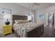 Bedroom with coastal decor and yellow nightstand at 112 Mangrove Ave, Anna Maria, FL 34216