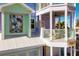 Balcony with ocean views and unique architectural details at 112 Mangrove Ave, Anna Maria, FL 34216