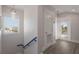 Hallway with access to a balcony and additional room at 112 Mangrove Ave, Anna Maria, FL 34216