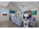 Living room with comfy seating and ocean-themed decor at 112 Mangrove Ave, Anna Maria, FL 34216