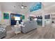 Open floor plan living room showcasing a kitchen and comfortable seating at 112 Mangrove Ave, Anna Maria, FL 34216