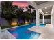 Modern pool with surrounding patio and lush landscaping at 112 Mangrove Ave, Anna Maria, FL 34216