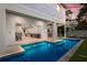 Expansive pool with patio and covered seating area at 112 Mangrove Ave, Anna Maria, FL 34216