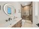 Elegant bathroom with a frameless glass shower and modern fixtures at 116 8Th Street S, Bradenton Beach, FL 34217