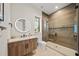 Modern bathroom with a walk-in shower and floating vanity at 116 8Th Street S, Bradenton Beach, FL 34217