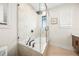 Relaxing bathroom with a walk-in tub and patterned tile at 116 8Th Street S, Bradenton Beach, FL 34217