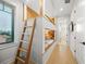 Bright bedroom with built-in bunk beds and window seat at 116 8Th Street S, Bradenton Beach, FL 34217