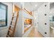 Bright bedroom with built-in bunk beds and window seat at 116 8Th Street S, Bradenton Beach, FL 34217
