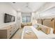 Bright bedroom with a king-size bed and built-in window seat at 116 8Th Street S, Bradenton Beach, FL 34217