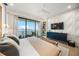Main bedroom with water views, large bed, and modern furnishings at 116 8Th Street S, Bradenton Beach, FL 34217