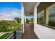 Relaxing deck overlooking the water, with a ceiling fan at 116 8Th Street S, Bradenton Beach, FL 34217
