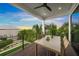 Waterfront deck with outdoor dining furniture at 116 8Th Street S, Bradenton Beach, FL 34217