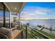 Relaxing deck with seating and stunning water views at 116 8Th Street S, Bradenton Beach, FL 34217