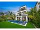 Modern three-story home with a private pool and stunning sunset views at 116 8Th Street S, Bradenton Beach, FL 34217