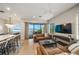 Bright living area showcasing water views and stylish furnishings at 116 8Th Street S, Bradenton Beach, FL 34217