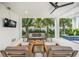 Relaxing outdoor patio with comfortable seating and tropical views at 116 8Th Street S, Bradenton Beach, FL 34217