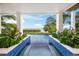 Inviting swimming pool and spa with a waterfront view at 116 8Th Street S, Bradenton Beach, FL 34217